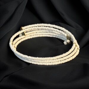 White beaded upper arm wrap bracelet